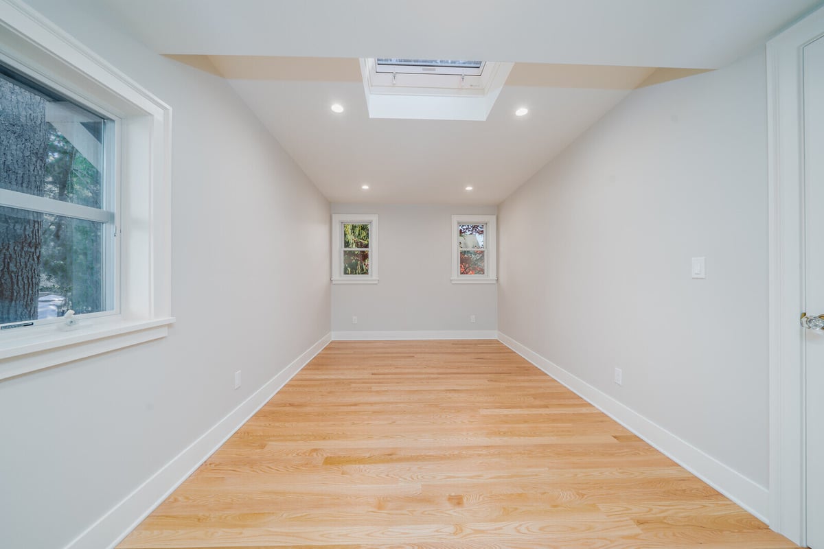 Bright and spacious living area with hardwood floors, remodeled by CB Construction in Seattle