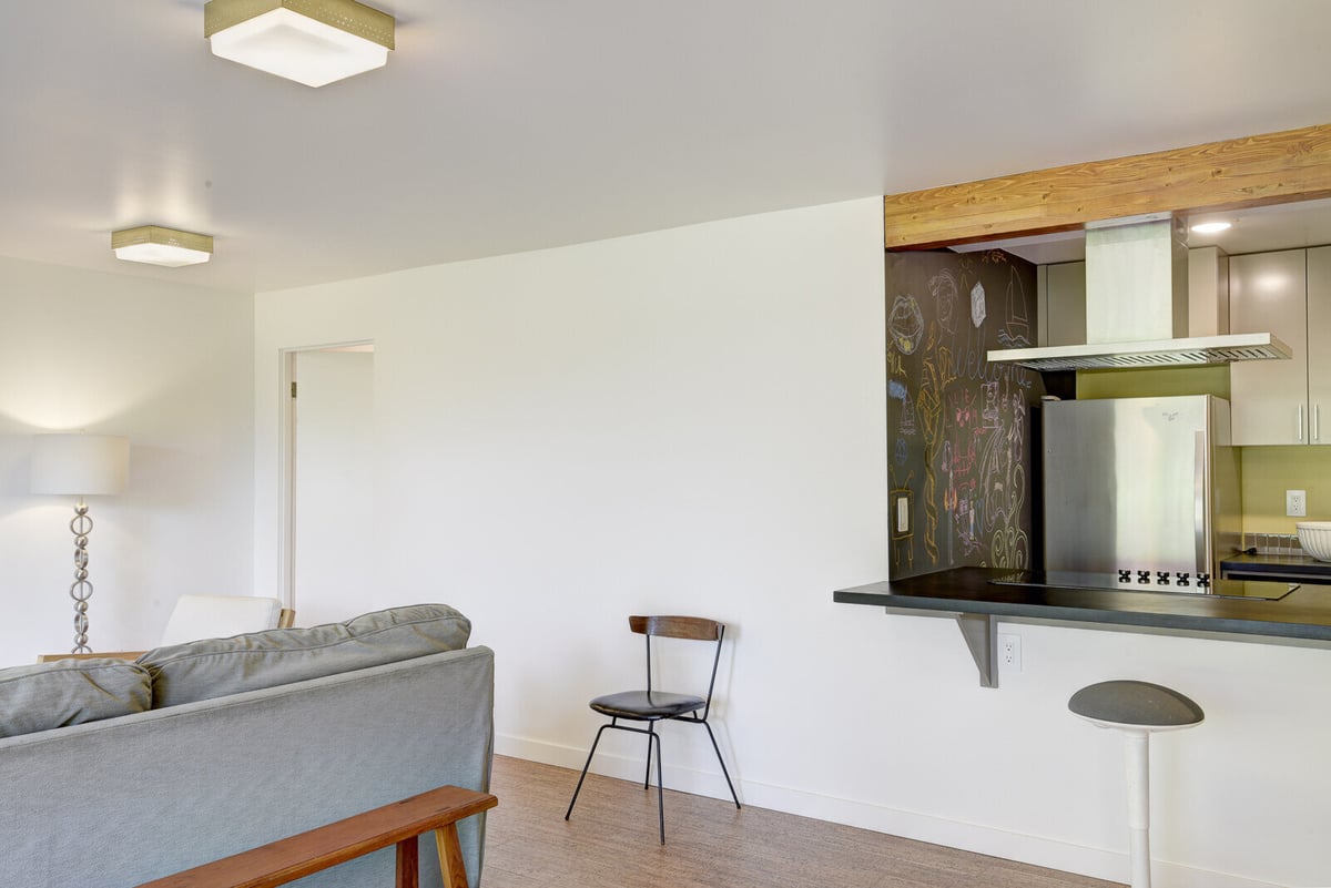 Built-in shelving in a Seattle basement ADU living area, part of a remodel by CB Construction