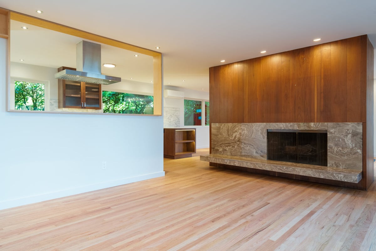 Bright and airy living room with hardwood floors and floating shelves, CB Construction, Seattle
