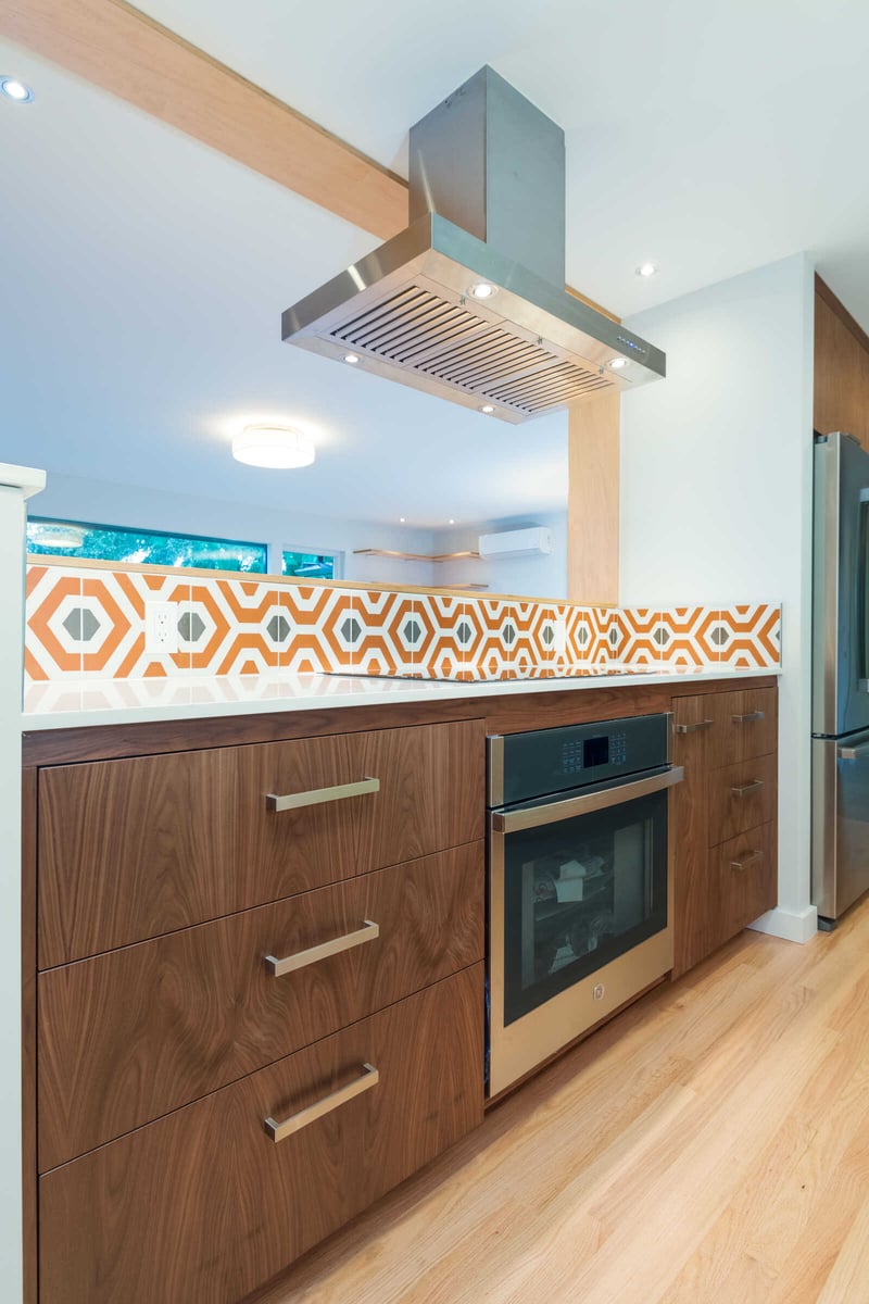 Contemporary kitchen remodel with wood drawers and vibrant backsplash, CB Construction, Seattle