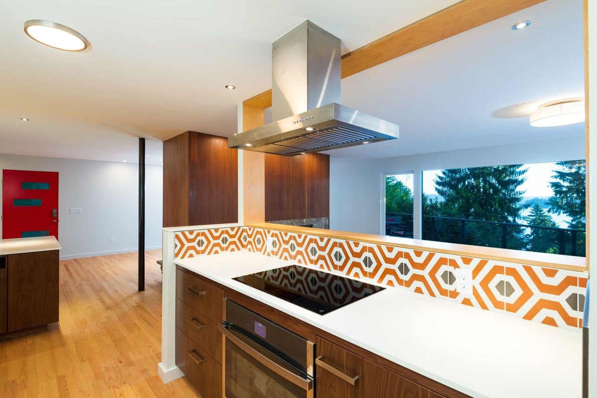 Modern kitchen with wood cabinets and stainless steel range, CB Construction, Seattle