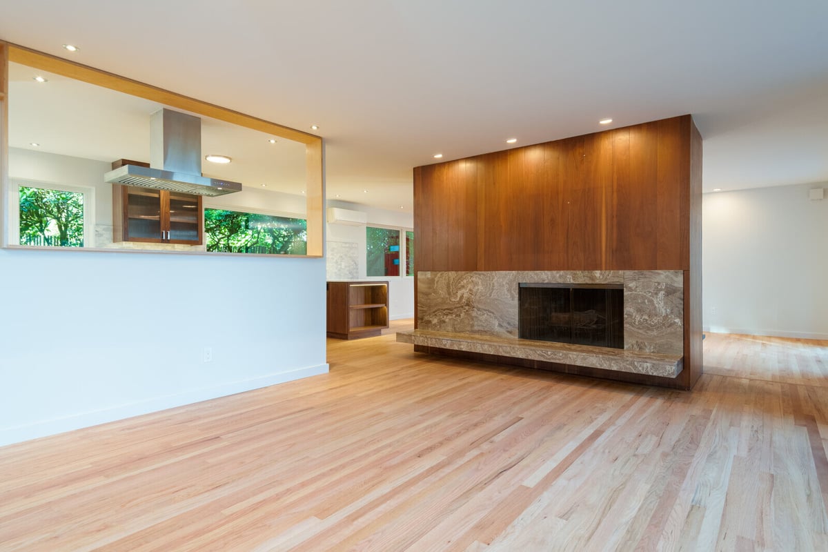 Wide hallway view of modern kitchen with wooden cabinetry, CB Construction, Seattle