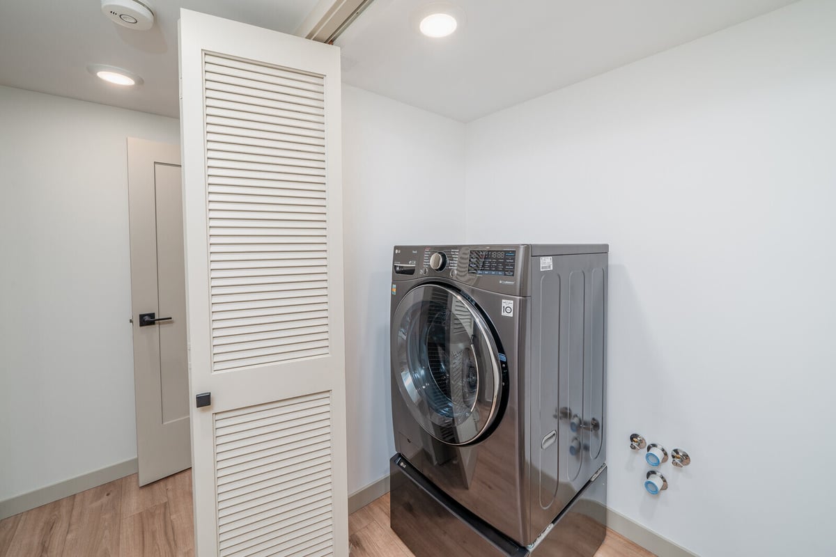 Spacious accessible bathroom in a Seattle ADU remodel by CB Construction, featuring modern fixtures