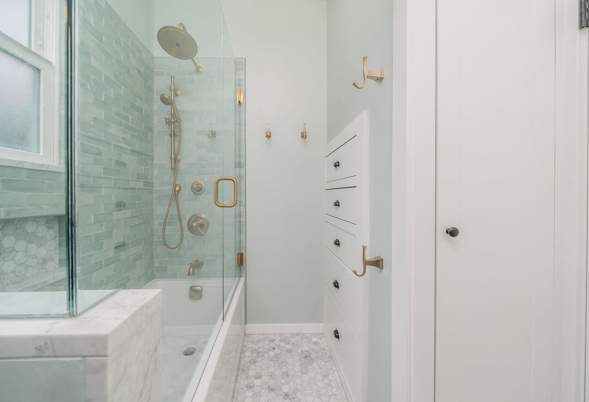 Seattle bathroom renovation featuring pedestal sink and glass shower by CB Construction